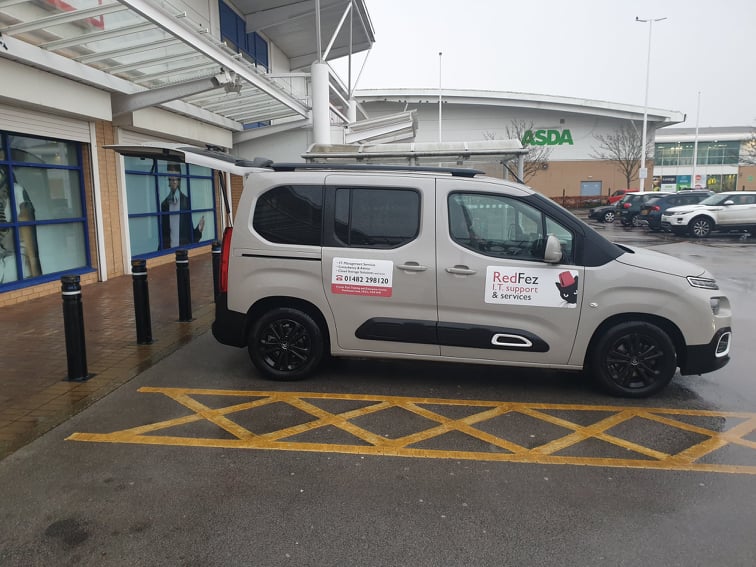 Yellow grid next to disabled parking space