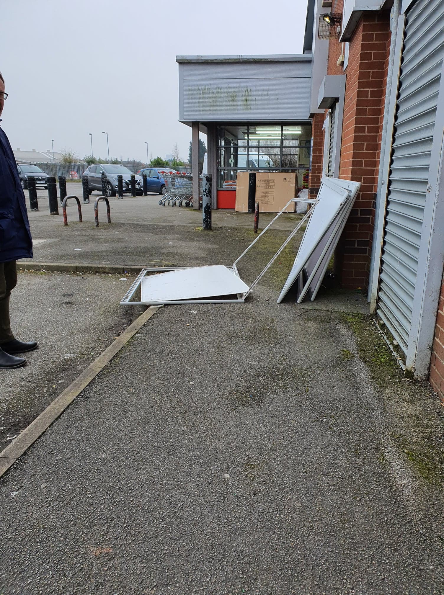 Debris blocking path to store entrance