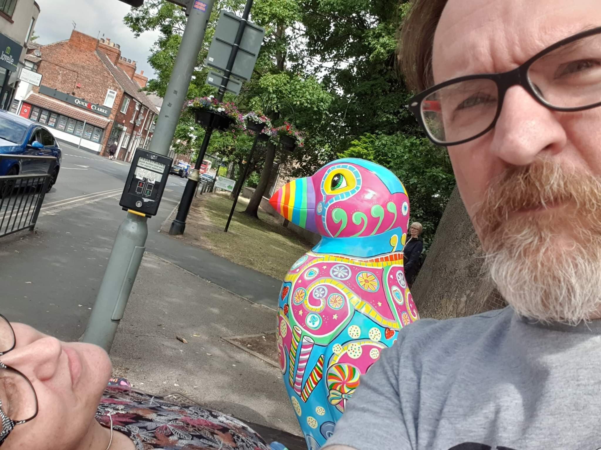 Robin selfie with puffin number 38 while Helen appears to be deceased