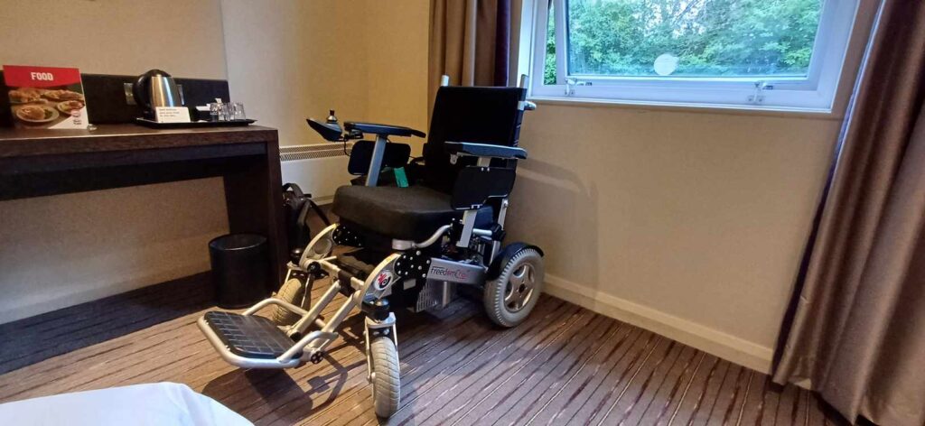 A powered wheelchair waiting to be occupied.