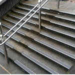 a staircase with textured anti-slip stair nosing