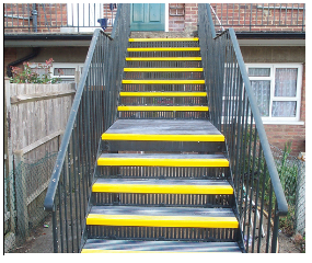 Outdoor staircase with bright yellow anti-slip stair nosing